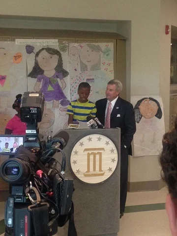 DJ SPEAKS TO THE PRESS AT THE 2015 SUMMER PRESS CONFERENCE AT CARVER HIGH SCHOOL