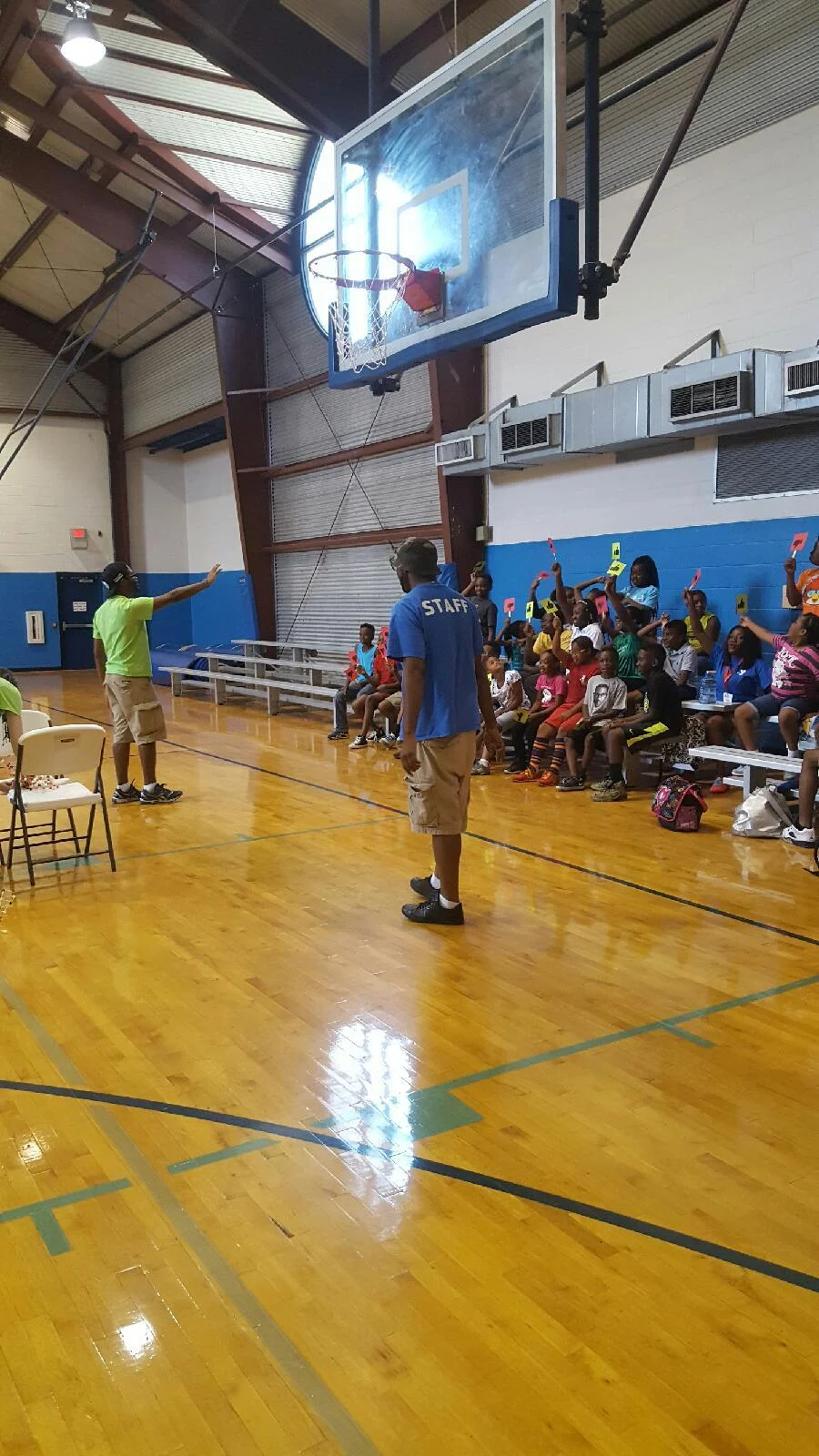 ROW INSTRUCTOR, AMOS DAVIDSON, LEADS THE KIDS THROUGH AN EXPLANATION OF THE OUR WEEK 1 ENGINEERING LESSON.