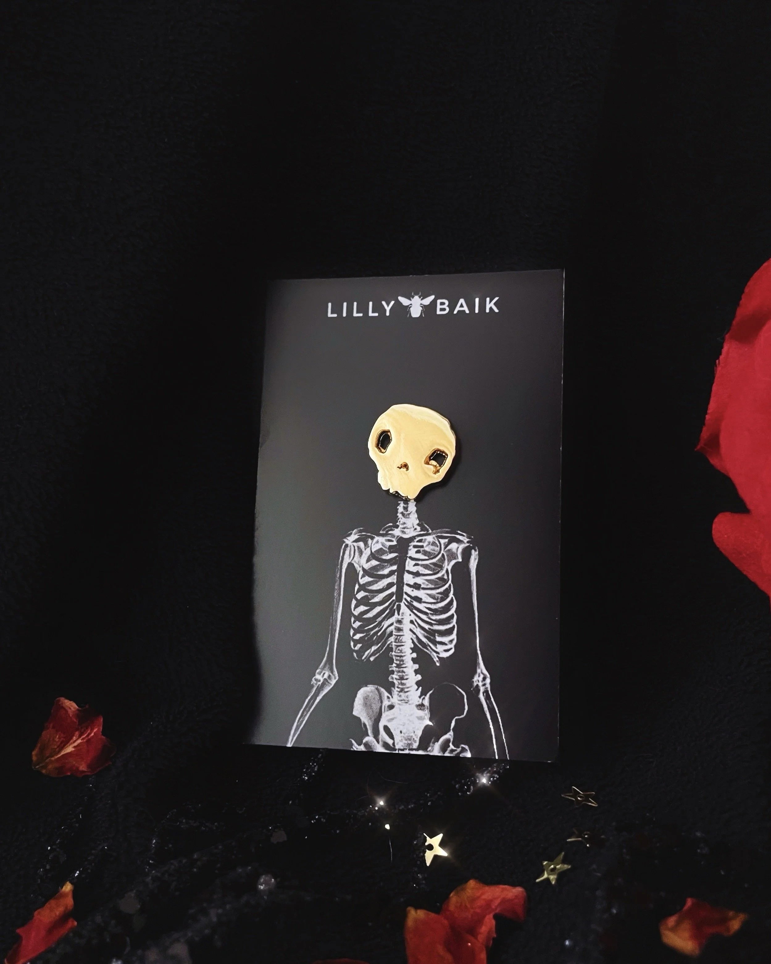 golden skull mini lapel pin by lilly baik.