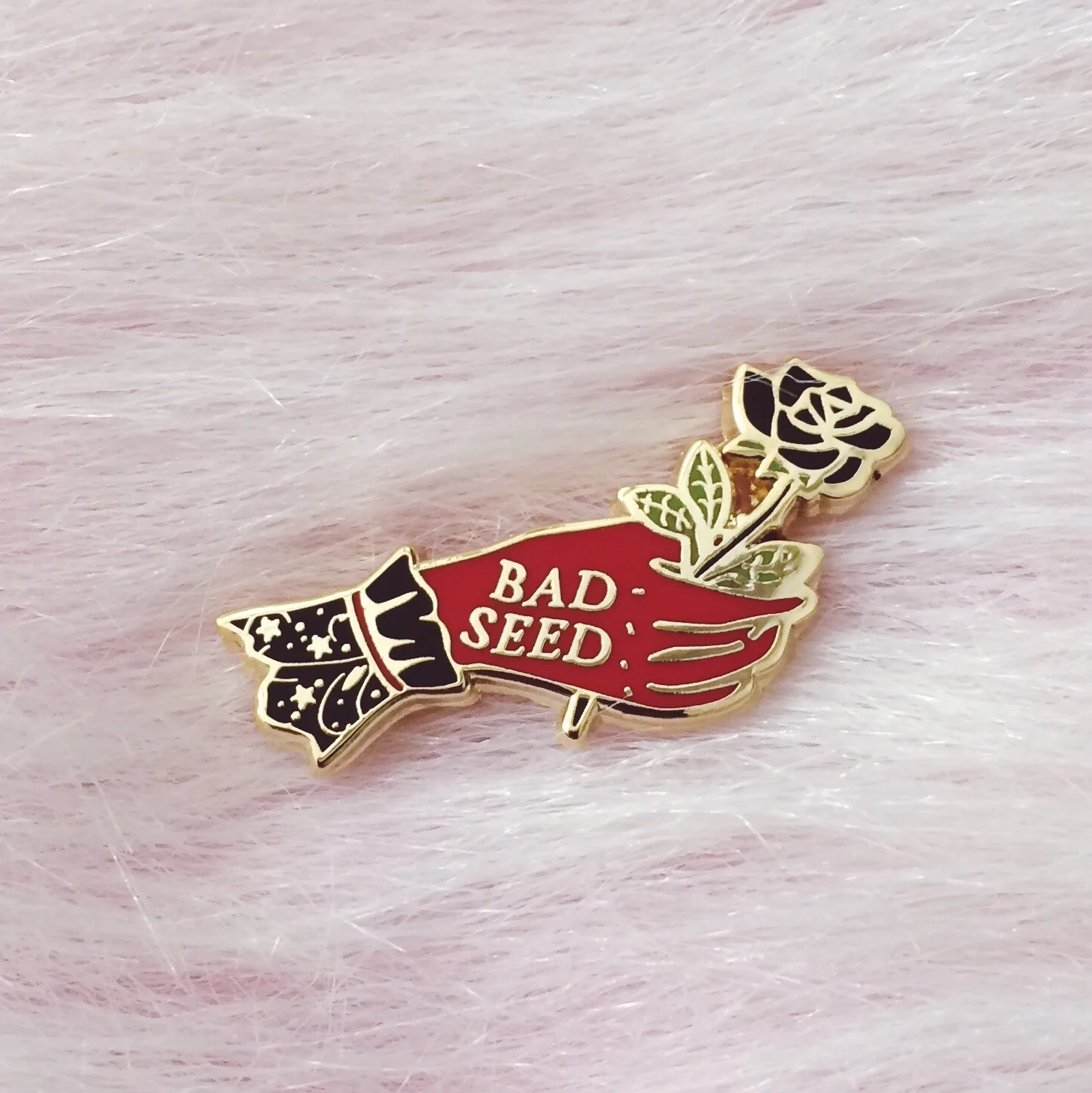 bad seed red right hand hard enamel pin inspired by nick cave and the bad seeds by lilly baik.