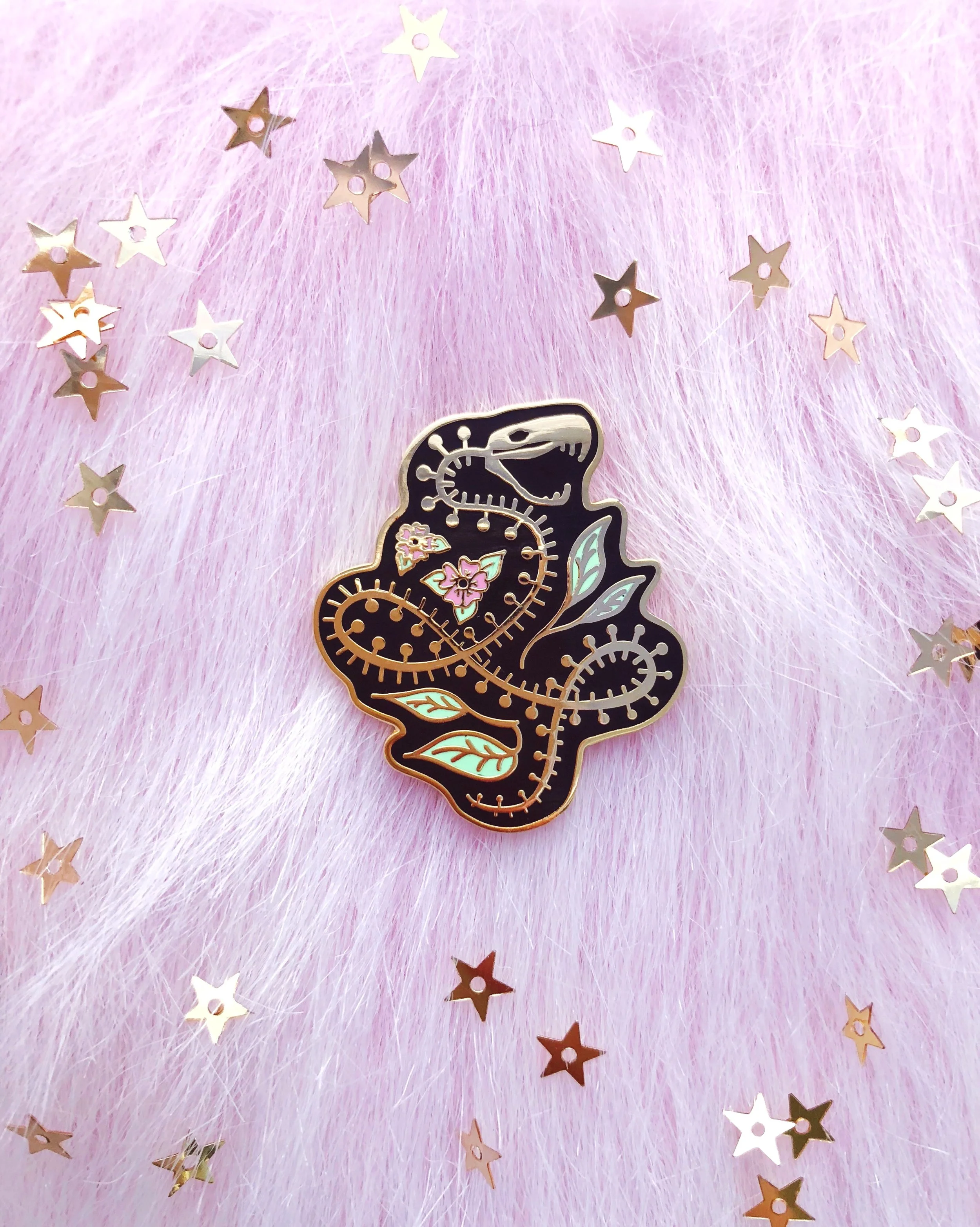 snake skeleton nature-inspired gold hard enamel pin by lilly baik.