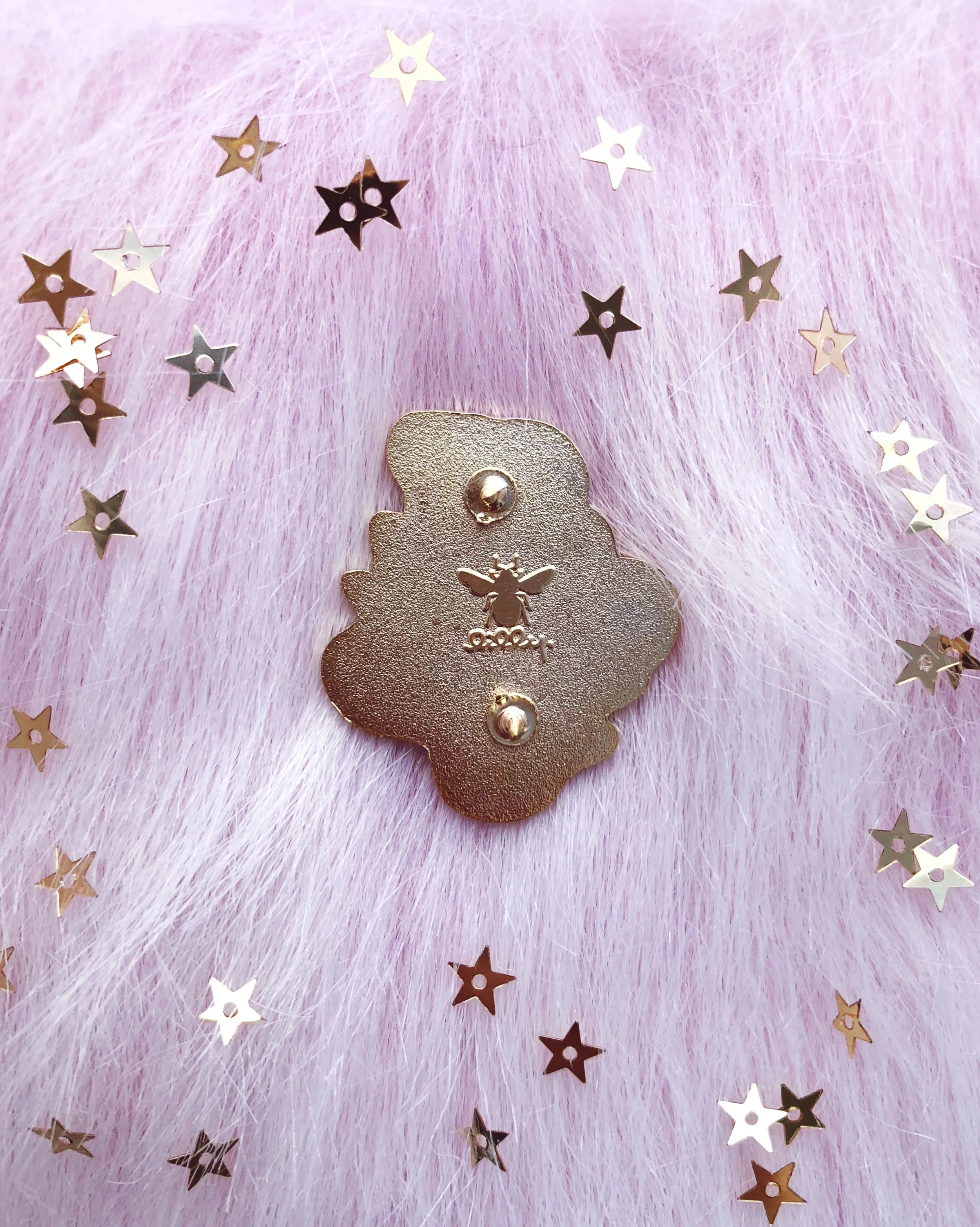 snake skeleton nature-inspired gold hard enamel pin by lilly baik.