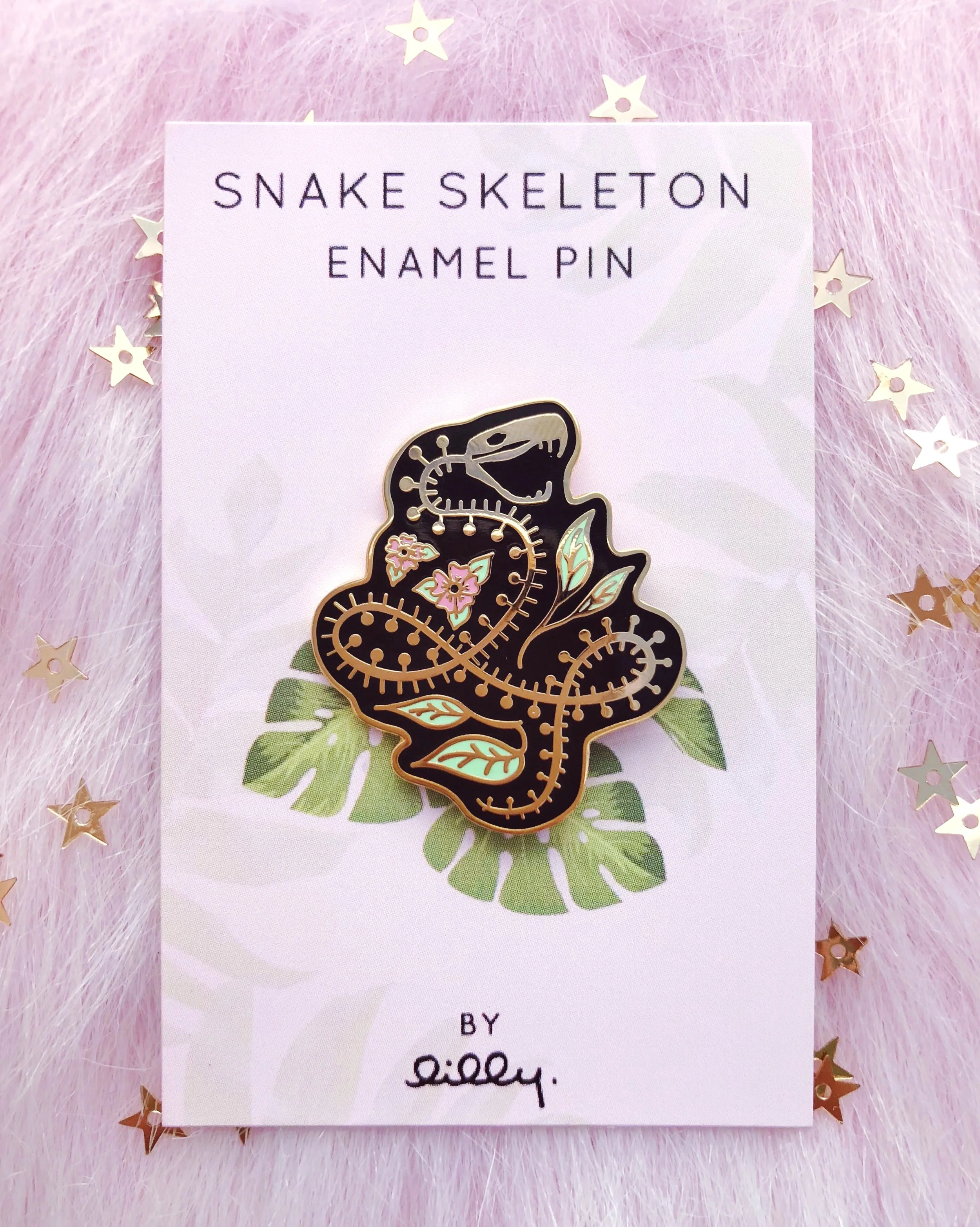 snake skeleton nature-inspired gold hard enamel pin by lilly baik.