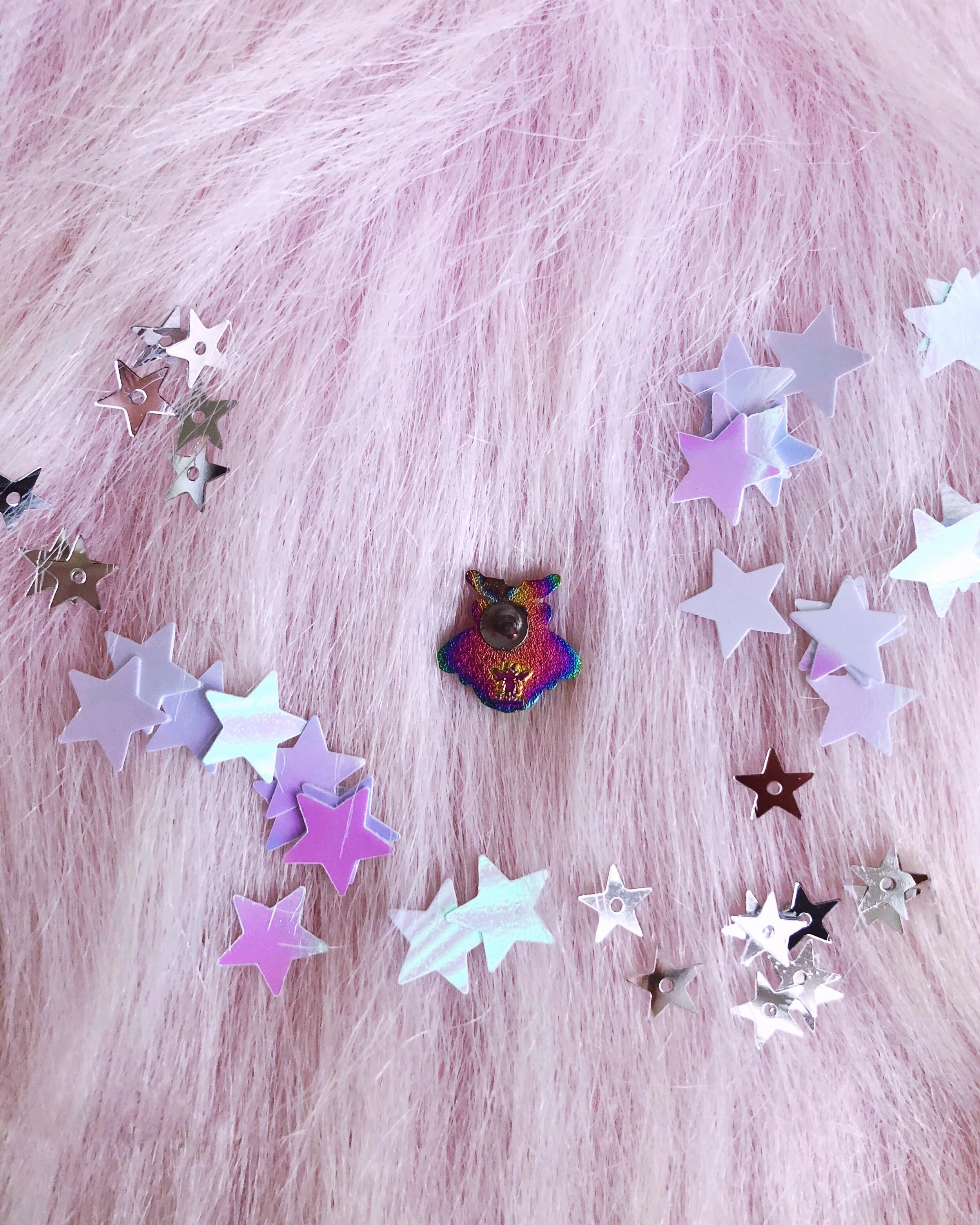 the rainbow bee 3d anodized metal animal nature pin designed by lilly baik.