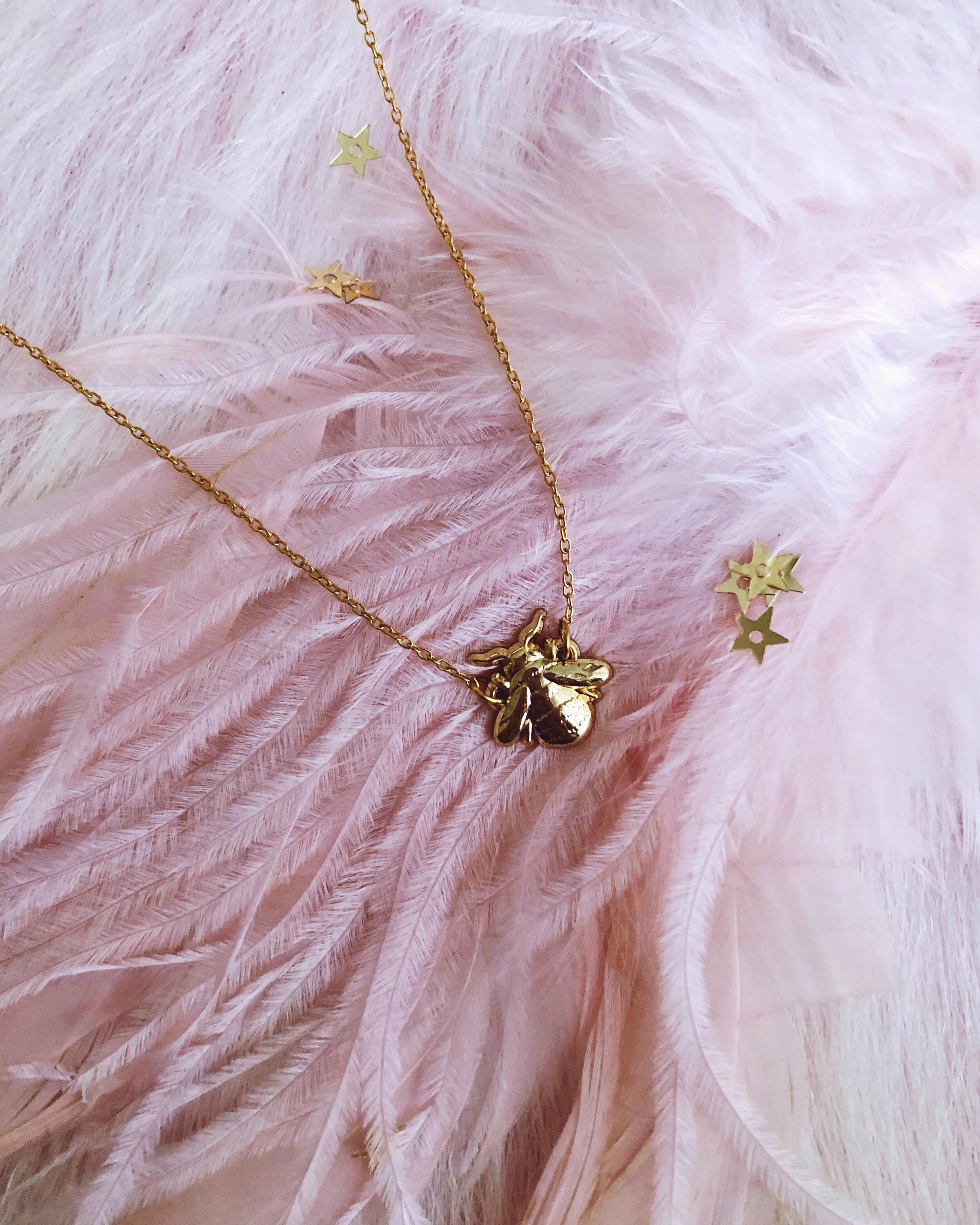 the golden bee necklace, mini gold bee animal nature delicate dainty jewelry accessory piece by lilly baik.
