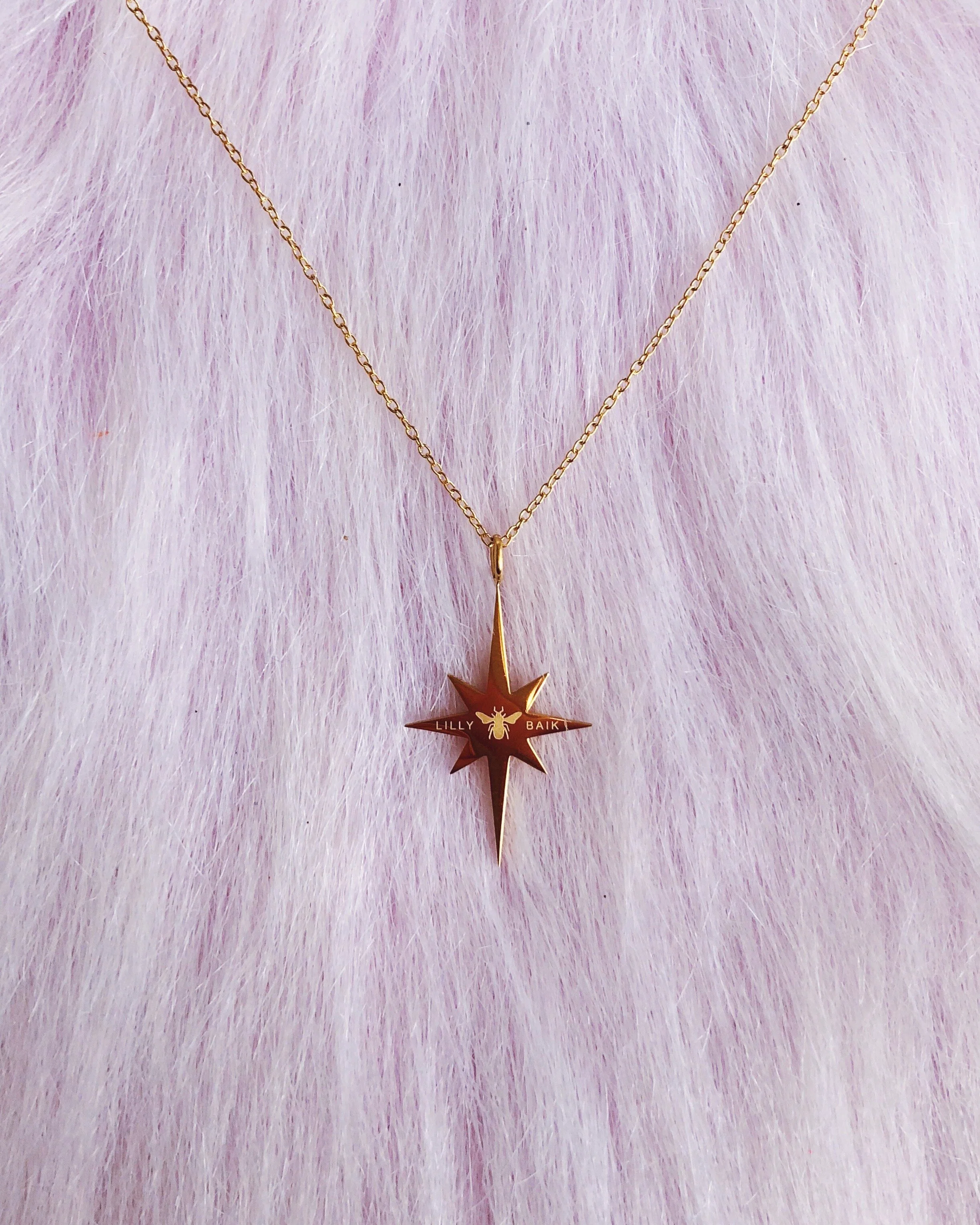 starburst opal necklace in sky blue, delicate dainty gold pretty star necklace designed by lilly baik.
