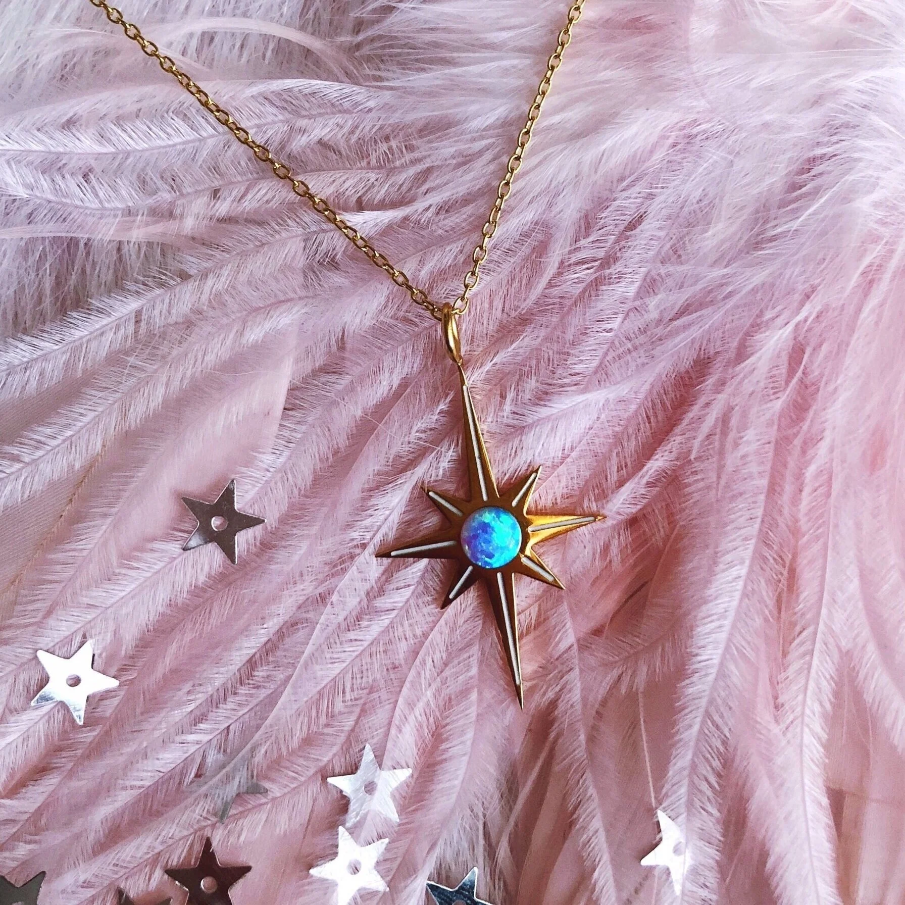 starburst opal necklace in sky blue, delicate dainty gold pretty star necklace designed by lilly baik.