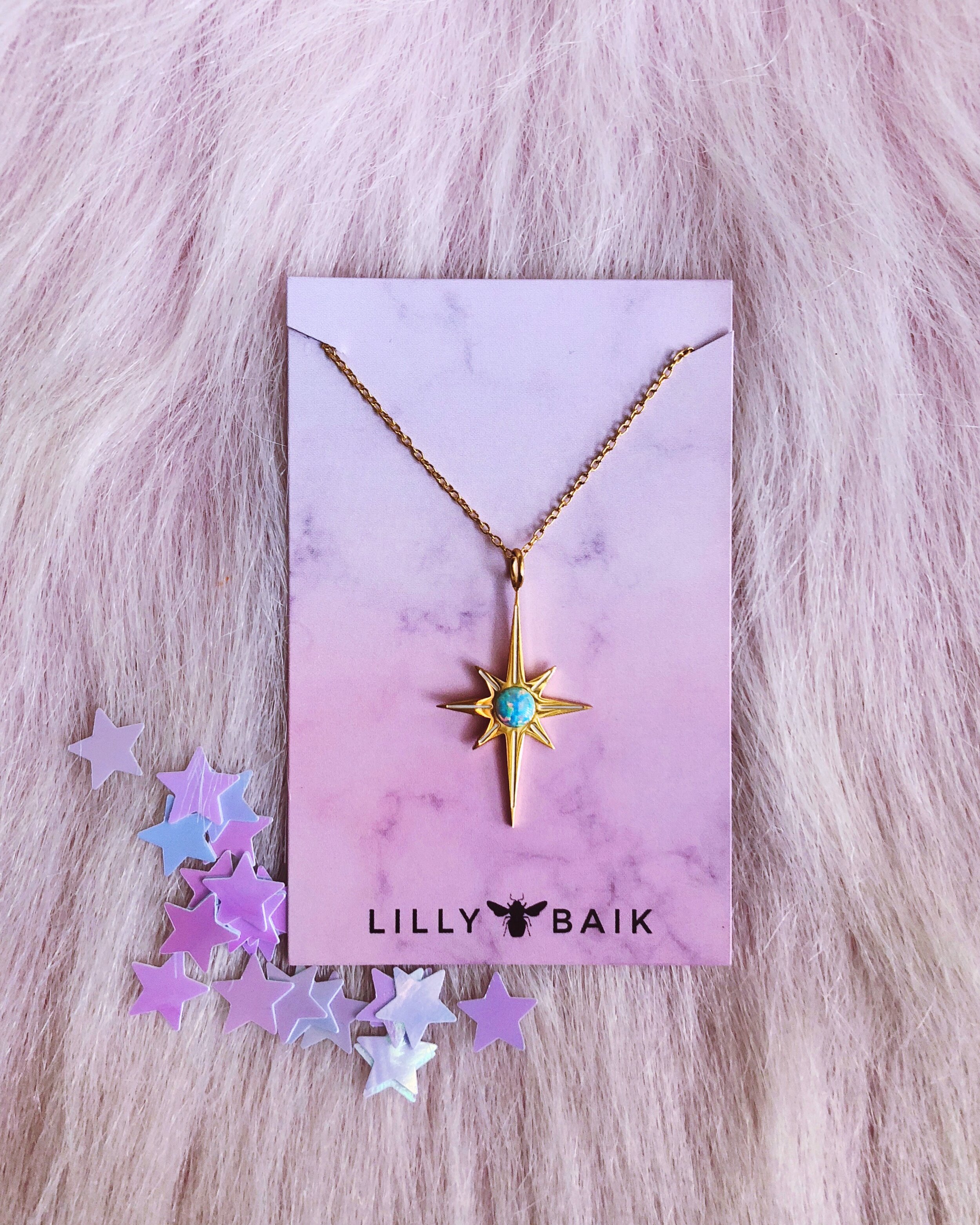 starburst opal necklace in seafoam green, delicate dainty gold pretty star necklace designed by lilly baik.