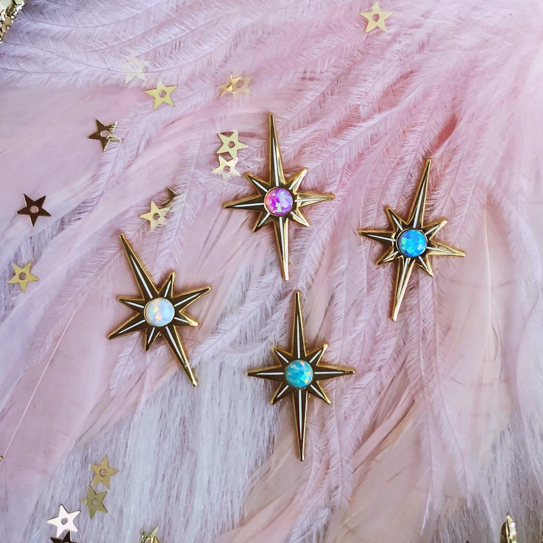 starburst opal 4 pack hard enamel star pin set designed by lilly baik.