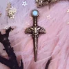 antique bee sword 3D pin, celestial honey bee floral roses opal magic lapel pin by lilly baik.