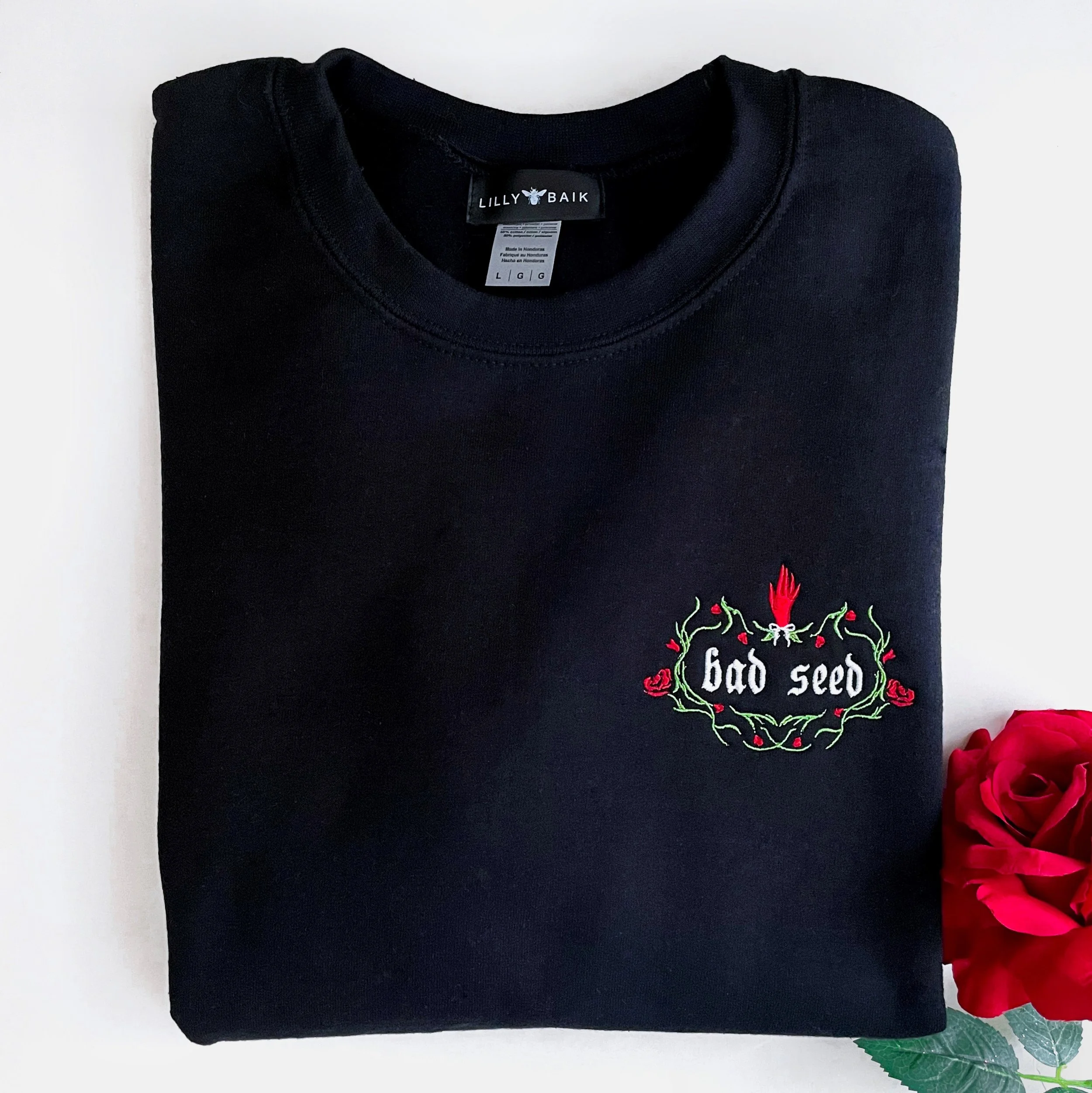 bad seed sweater main square.JPG