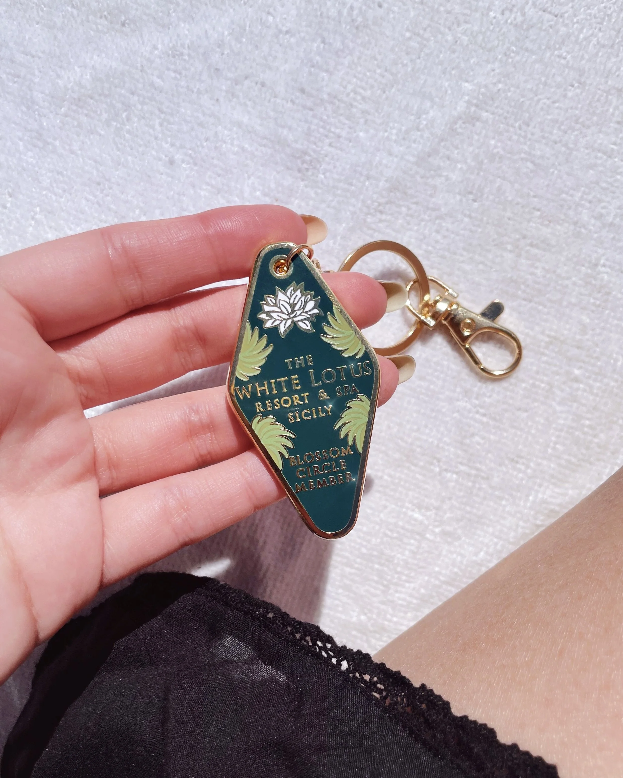 white lotus resort and spa sicily hotel motel tag enamel keychain by lilly baik.