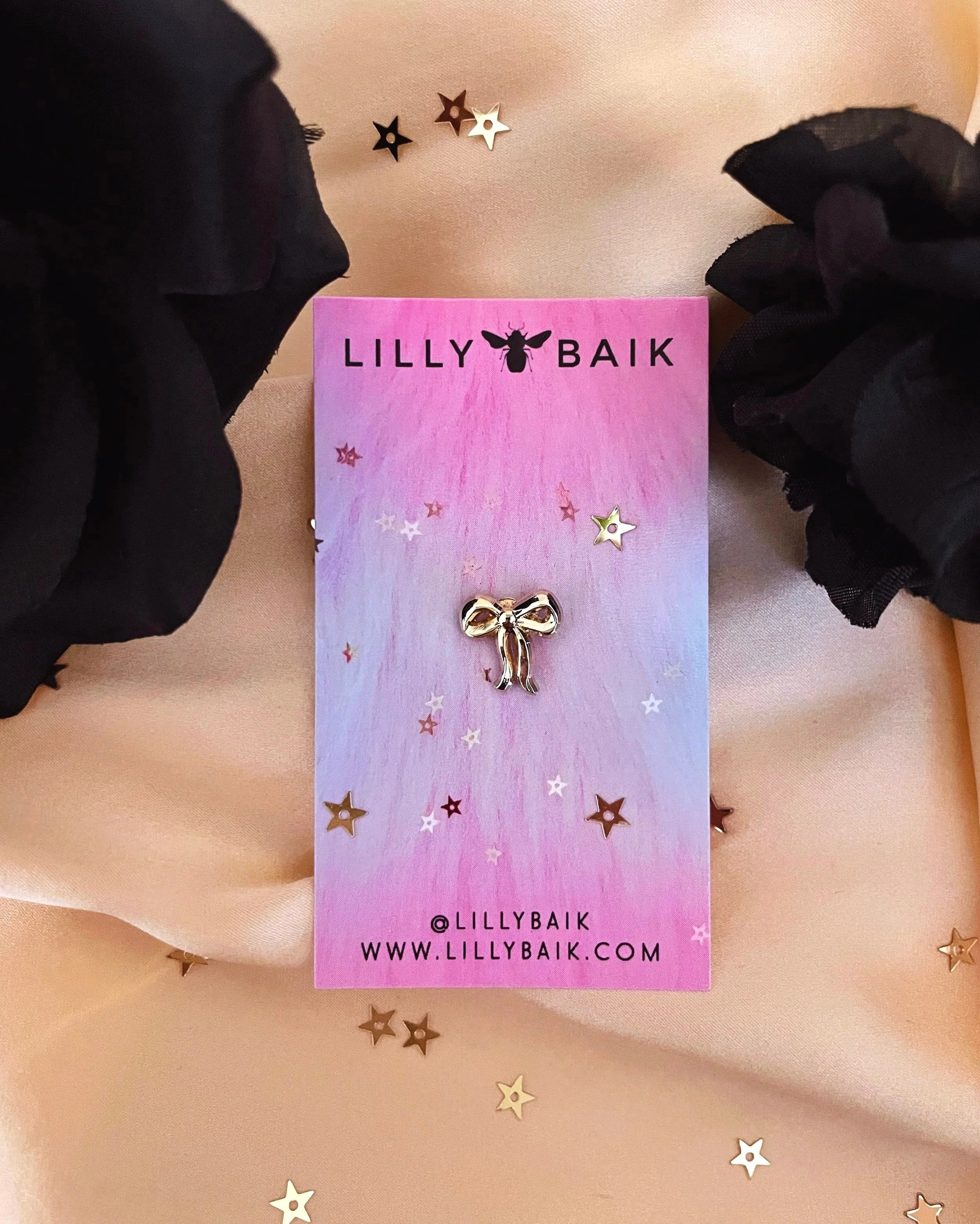 reverie mini metallic bow pin (gold) by lilly baik.