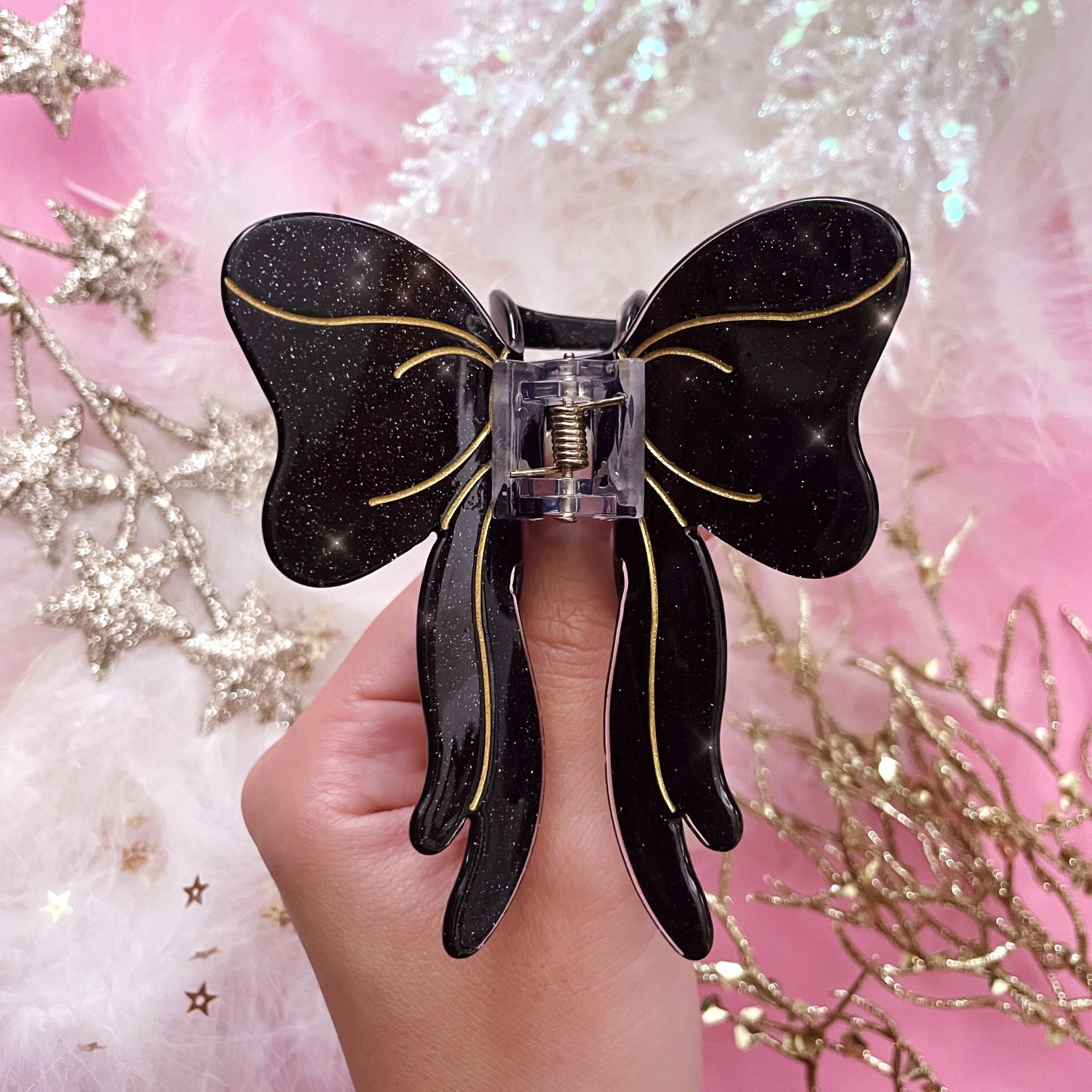 soiree bow hair clip glitter black gold acetate cute demure papillon ribbon hair claw by lilly baik.