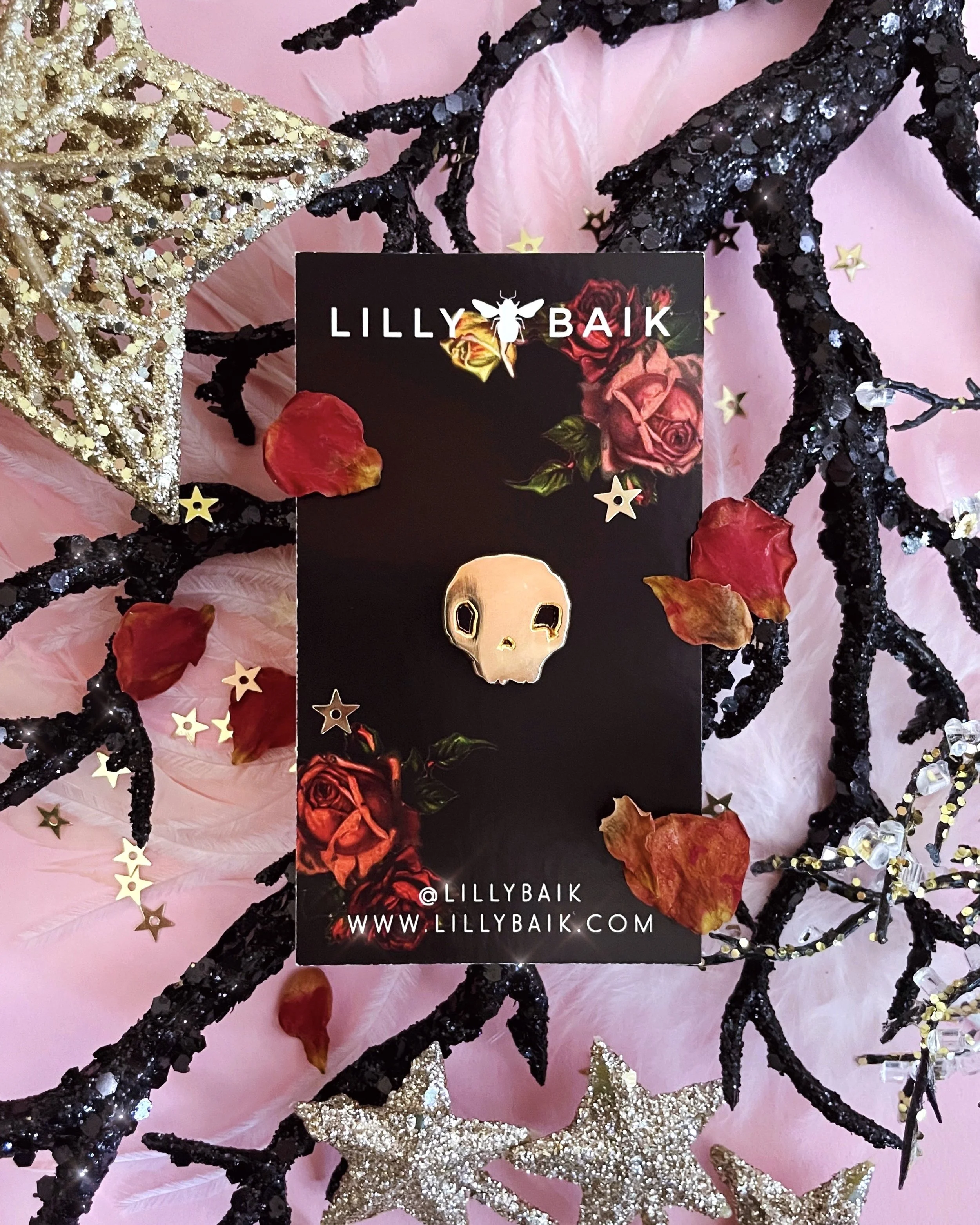 golden skull pin, memento mori cracked skull lapel pin by lilly baik.
