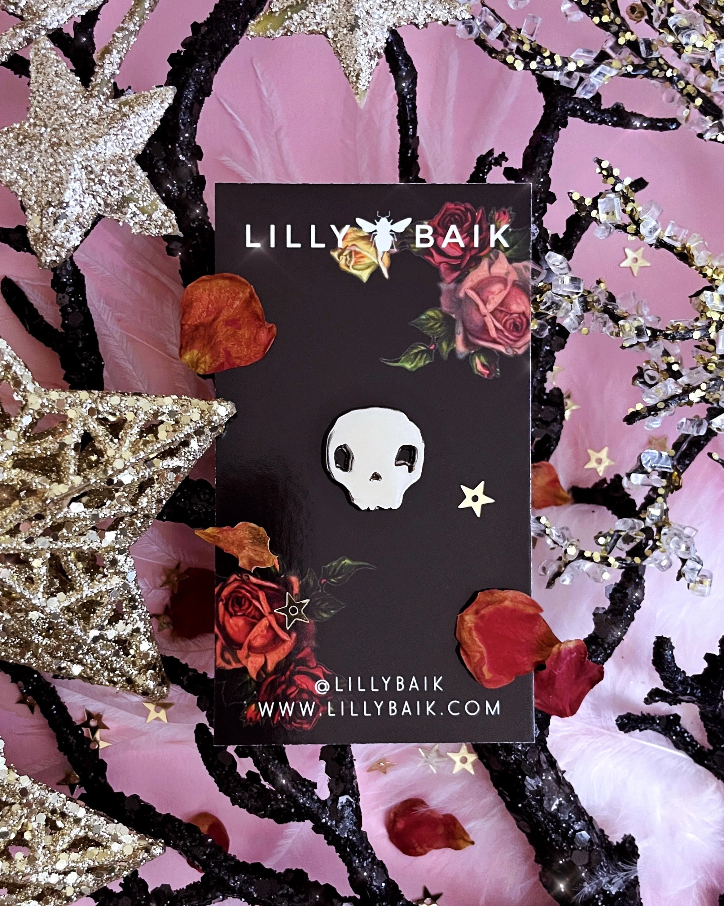 silver skull pin on card.jpg