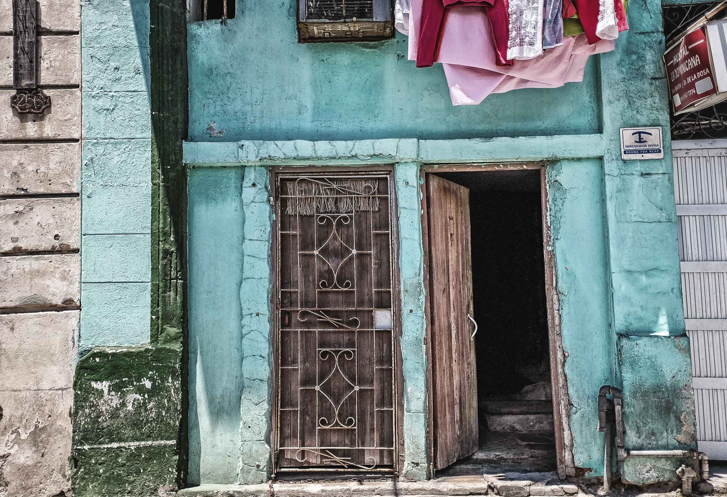 Blue Wall With Open Door and Laundry, Havana
