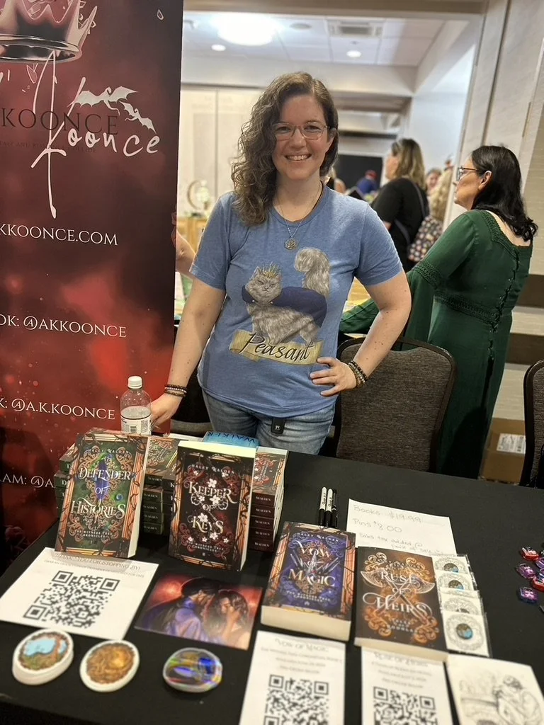 Haley at a book conference with her books