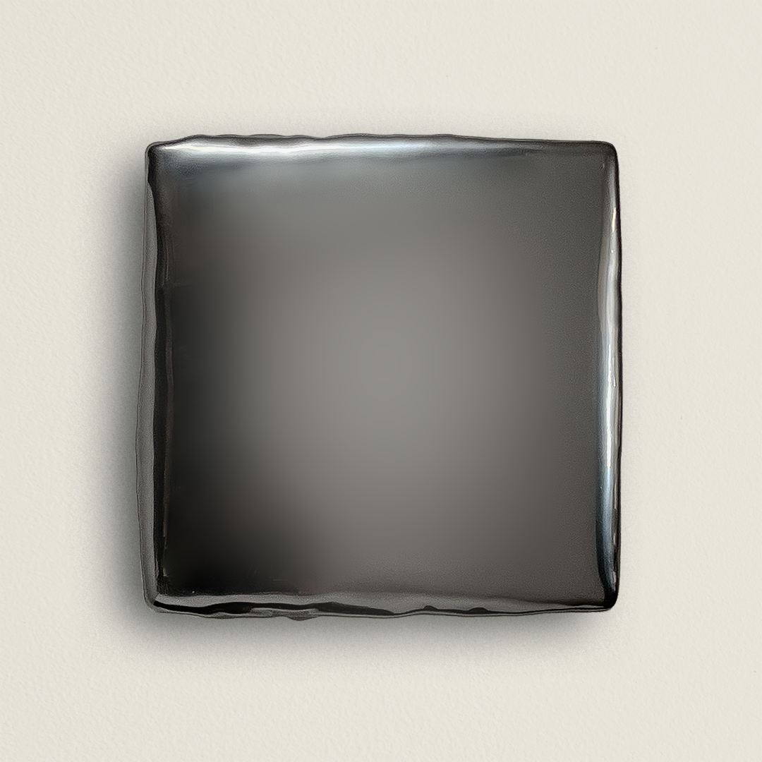   0162.2022      Graphite Emulsion      
12.5” H x 12.5” W x 3” D   
hand sculpted graphite emulsion   
polymer and resin emulsion on canvas   
signed in verso 