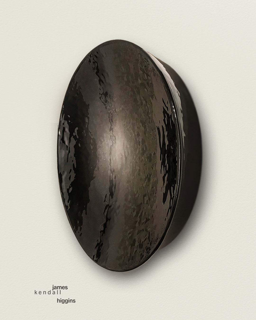   0139.2022      Graphite Emulsion     
43” Diameter x 7” Depth   
hand sculpted concave graphite emulsion   
polymer and resin emulsion on panel   
signed in verso