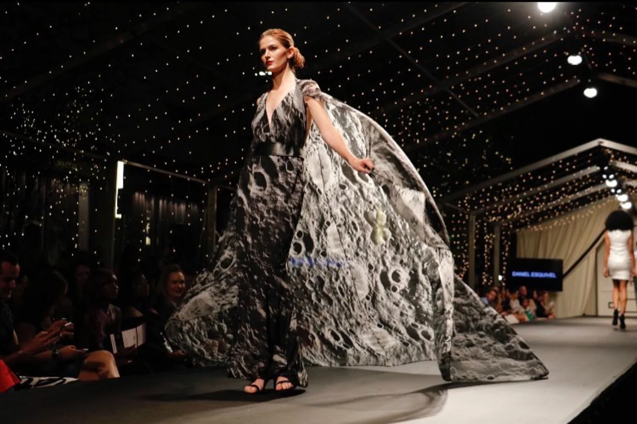 This lovely flowy cape dress by Daniel Esquivel gave the crowd chills as it floated across the runway. You seriously have to sport a hardcore smoky eye with this baby!