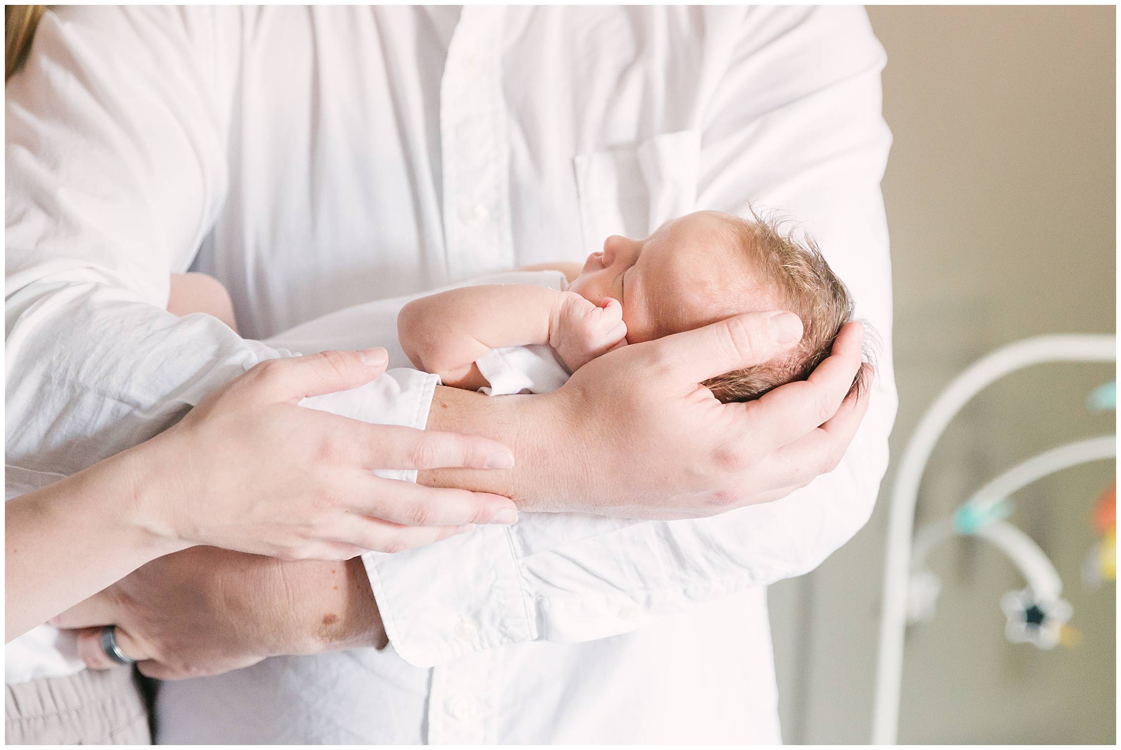 Baby in Father's Arms