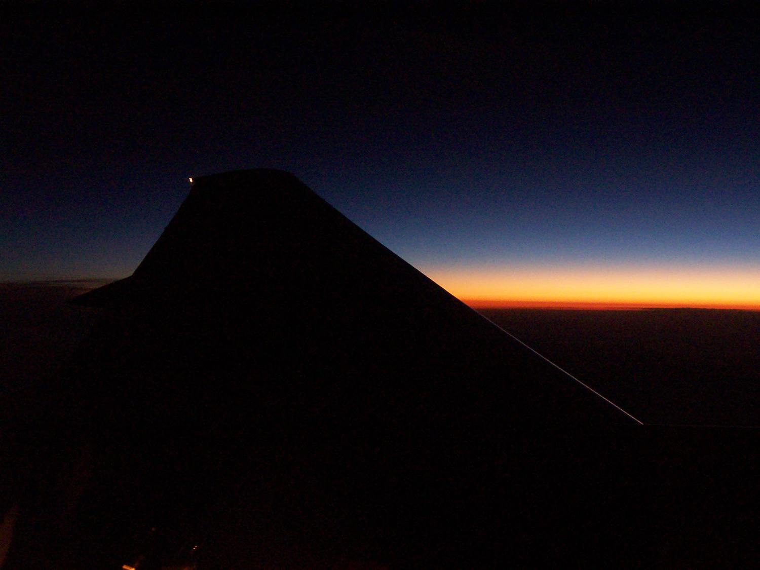    Sunset from the window of a plane   