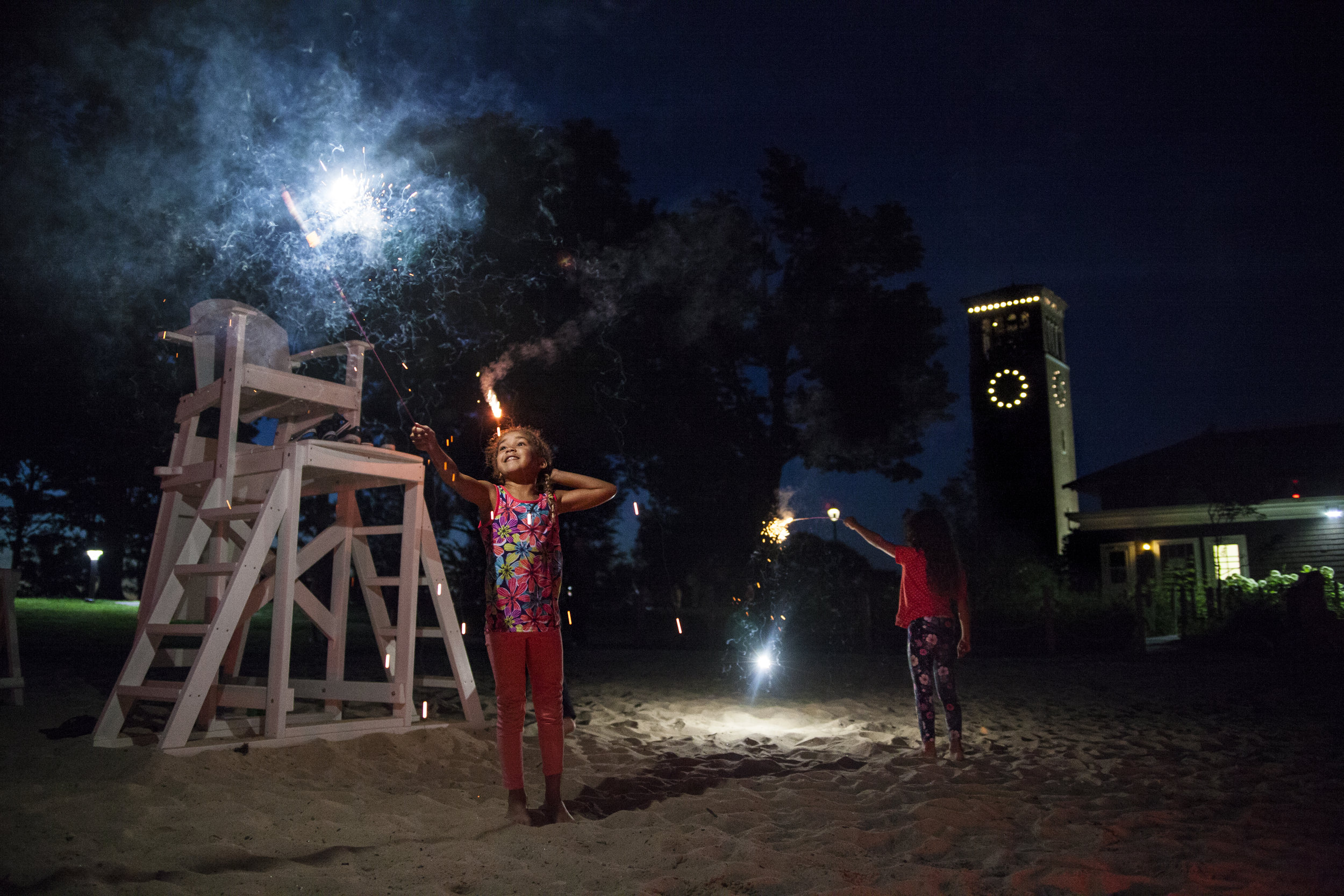 Nova Holland, left, and her sister Hana of Los Angeles, CA celebrate the fourth of July on Children’s Beach at the Chautauqua Institution in Chautauqua, NY.
