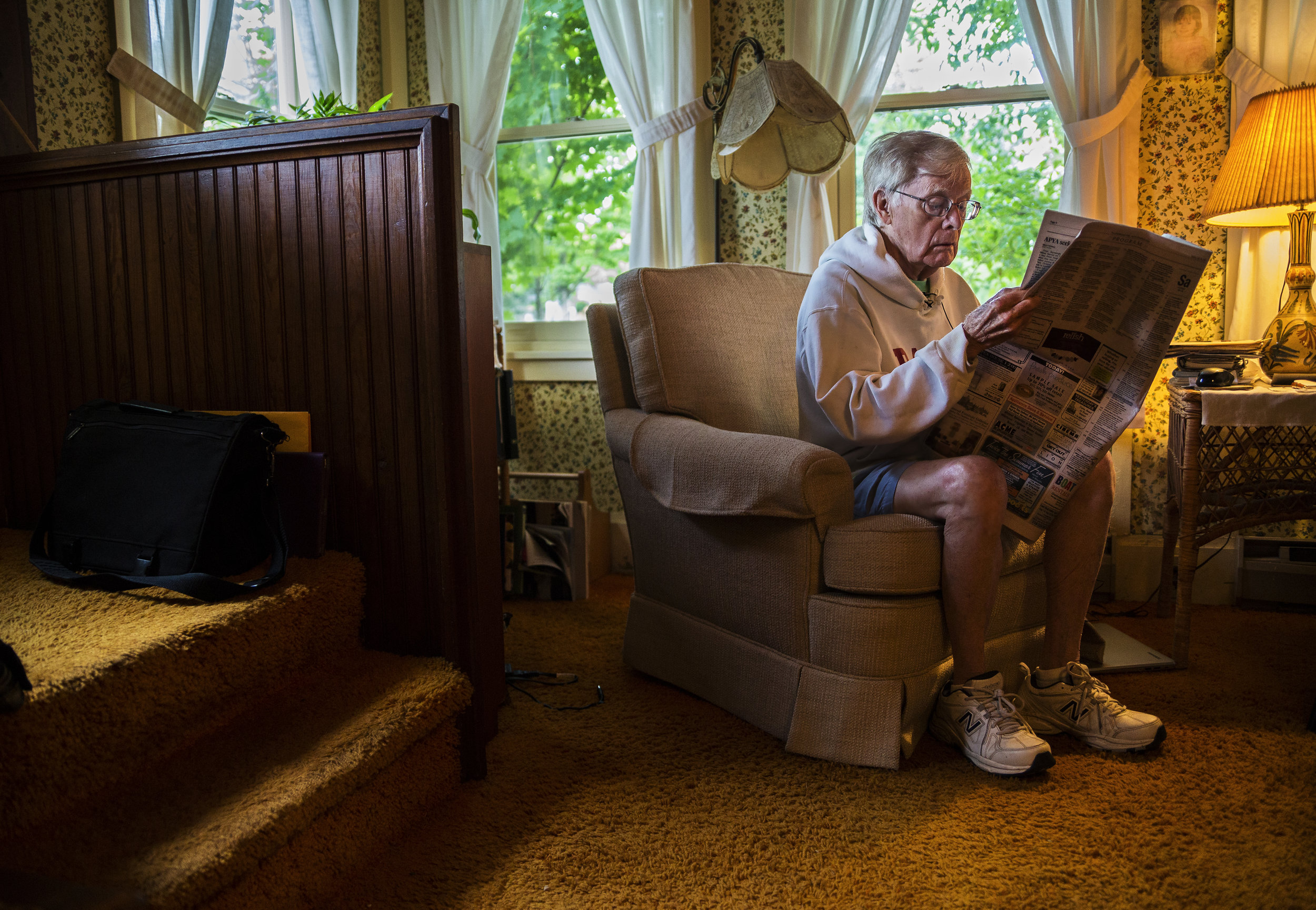 Bud Horne, 92, looks for his Letter to the Editor in The Chautauquan Daily in his home on Saturday, July 29, 2017. Horne wrote a list of “Unofficial Rules “for the Old First Night Race for his fellow runners to read before the big day.