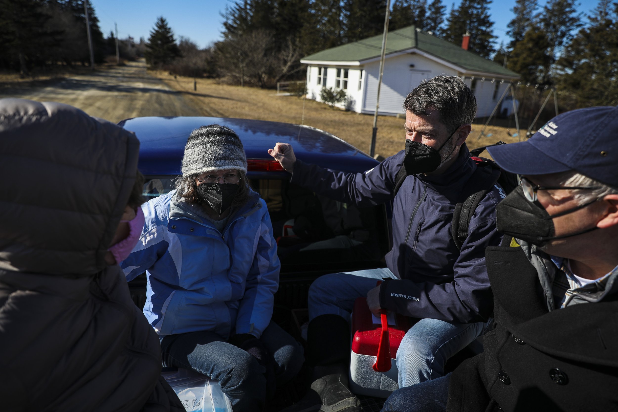  The Seacoast Mission crew, from left RN Maureen Giffin, RN and and director of island health services Sharon Daley,  Island Outreach Director and Chaplain Douglas Cornman, and Seacoast Mission President John Zavodny cram into the back of a pickup tr