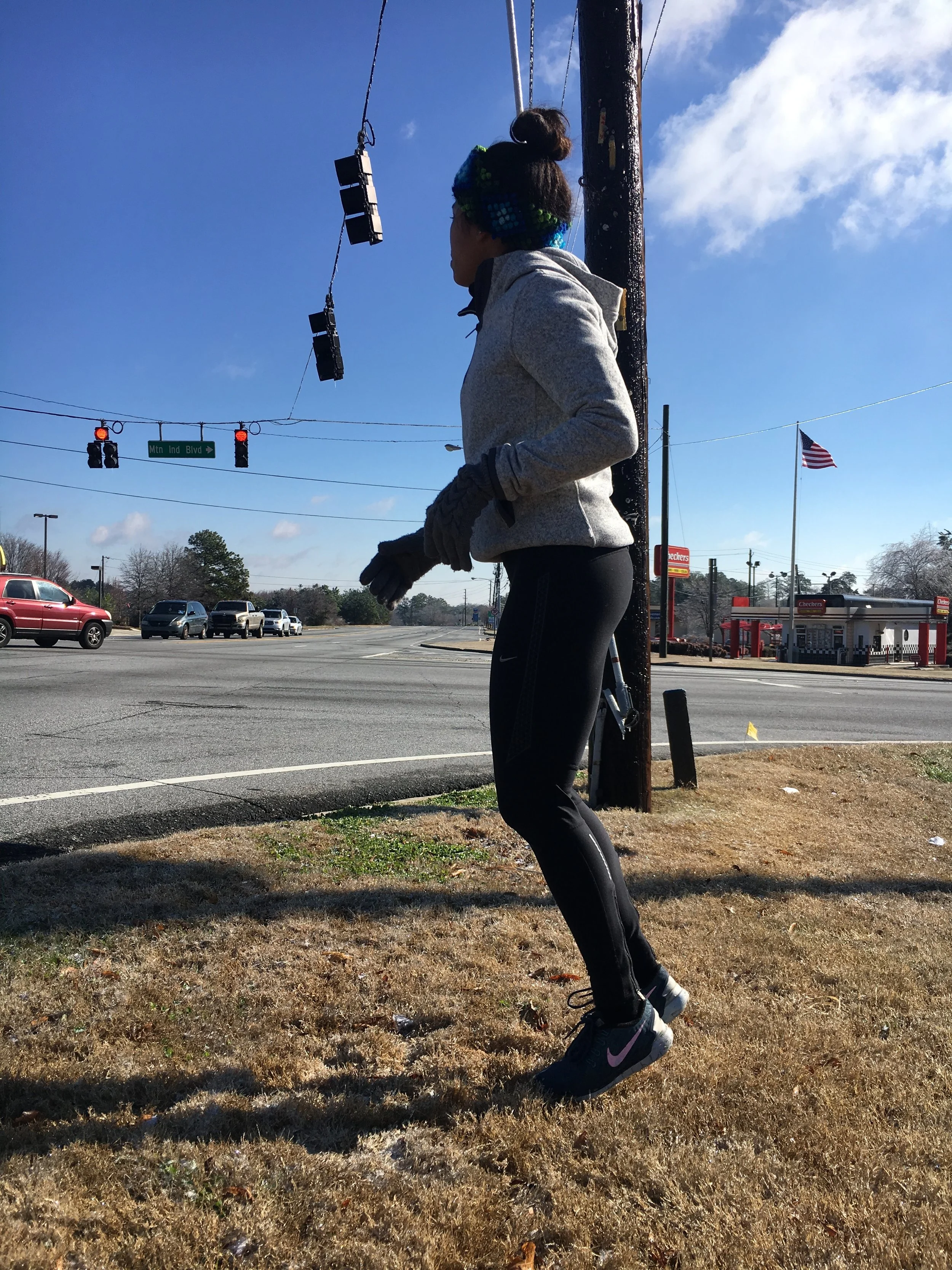 Jogging in place at a traffic light.