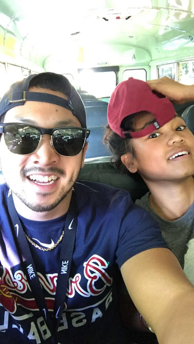 My brother and I being derpy on the bus-ride to the park.