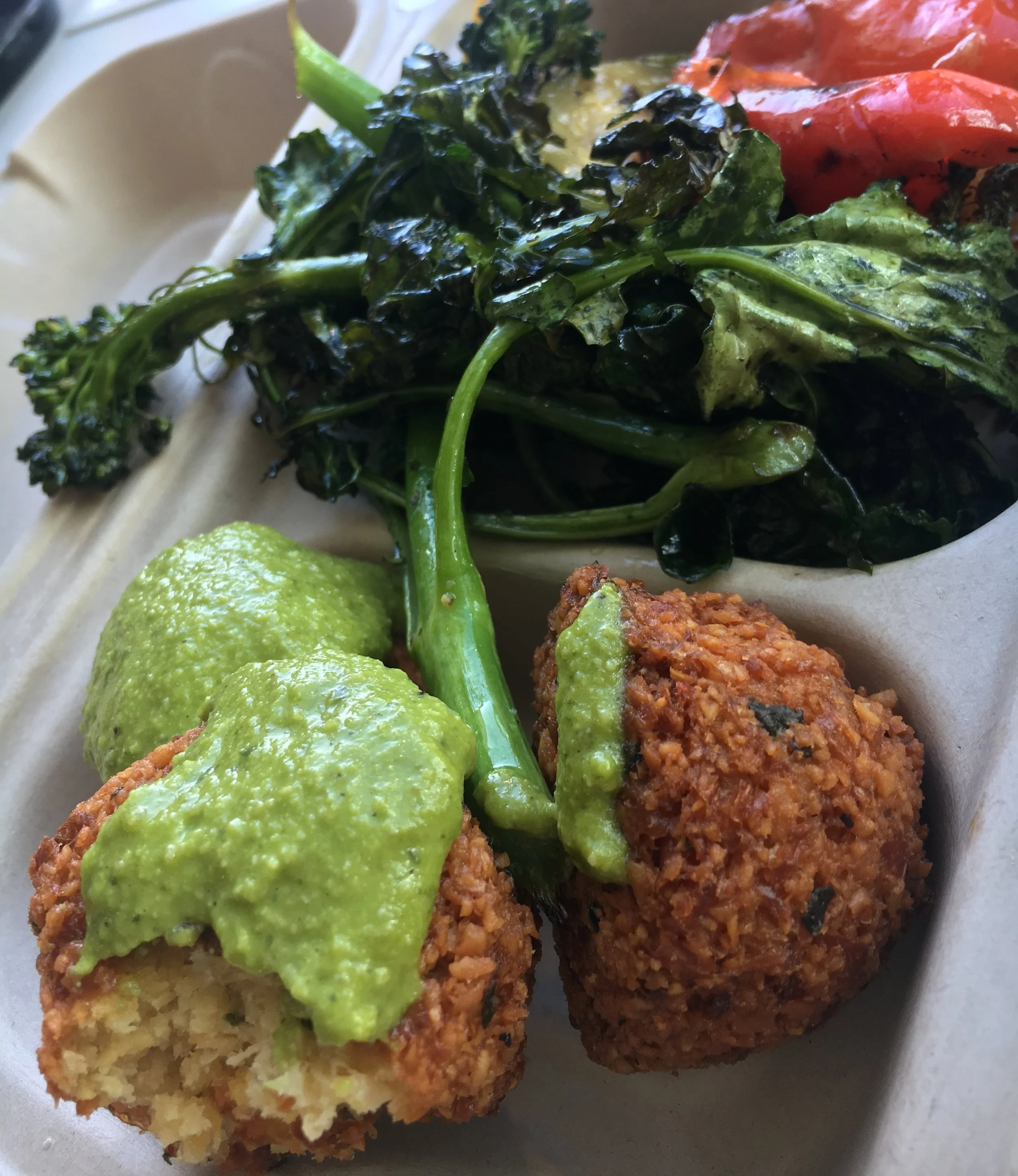 Falafel with some type of amazing sauce.