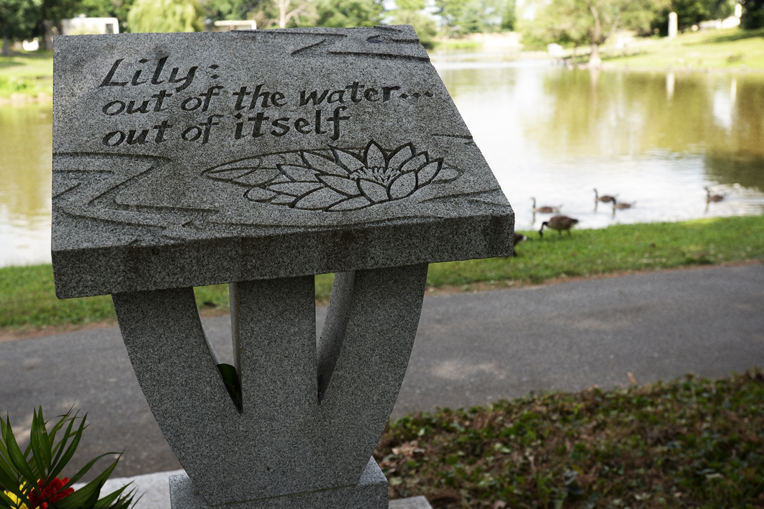 The stone podium carved with Nick's most popular haiku.