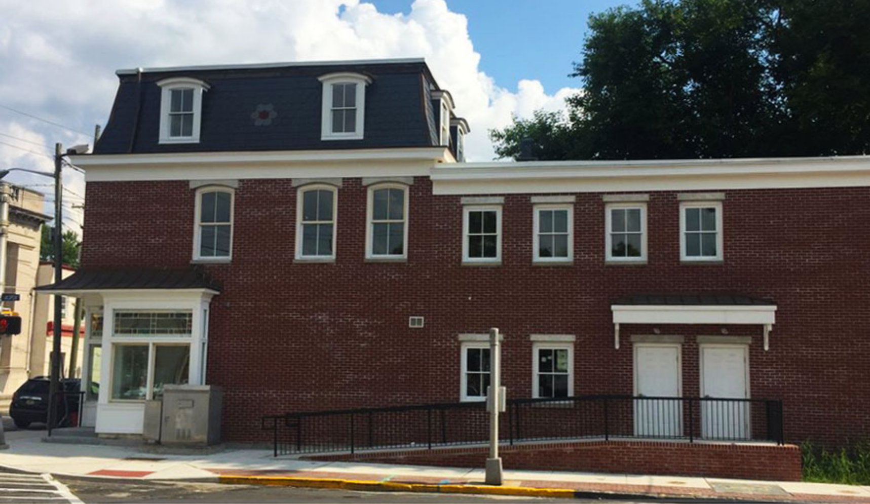 A view of the renovated Nick Virgilio Writers House as seen from Jasper Street.