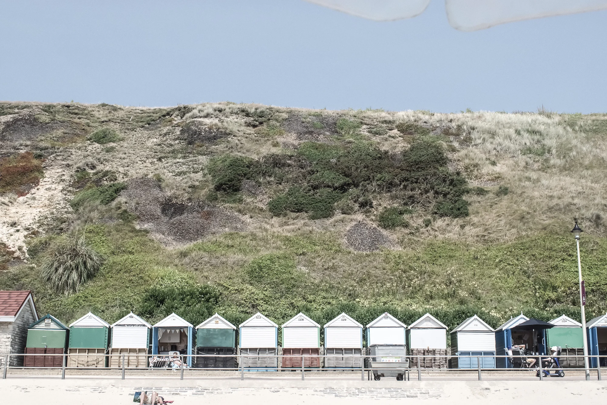 beach-huts-mountain--sand-beach.jpg