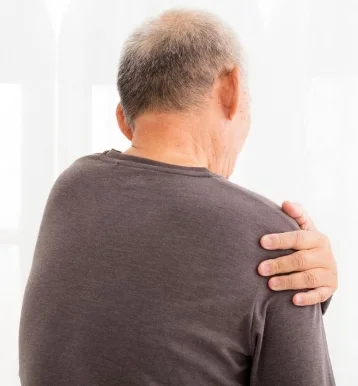 old guy shoulder.jpg