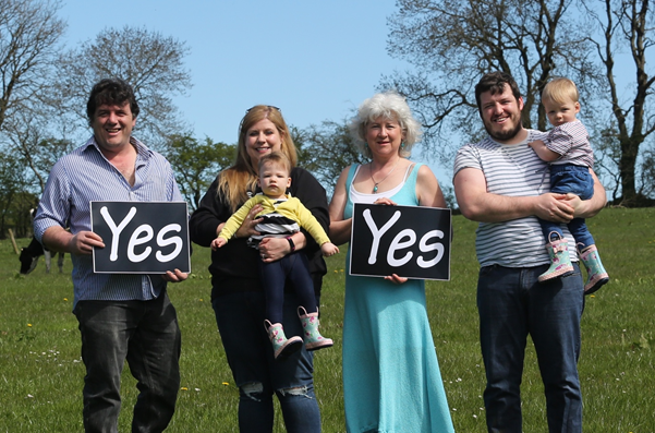 On our Farmers for Yes road trip, this farming family wanted to show their support across 3 generations (photo by Georgina Willis)