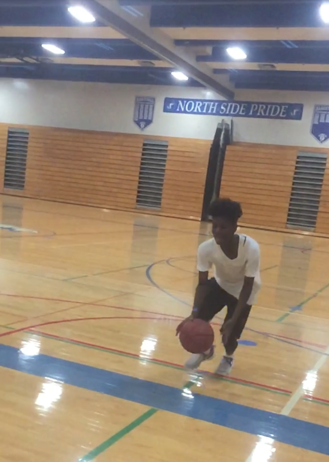 I practice on my own every day of the week but Fridays. That's when I play with my AAU team. This is me working out after school at North High just to get to the next level. Greatness is not going to be handed to you. It’s up to you if you are going to put in the work to get to the next level in your future. A reason I work out after school is because I know my family wants the best for me, and I have to put in the work to get them out of the hood.