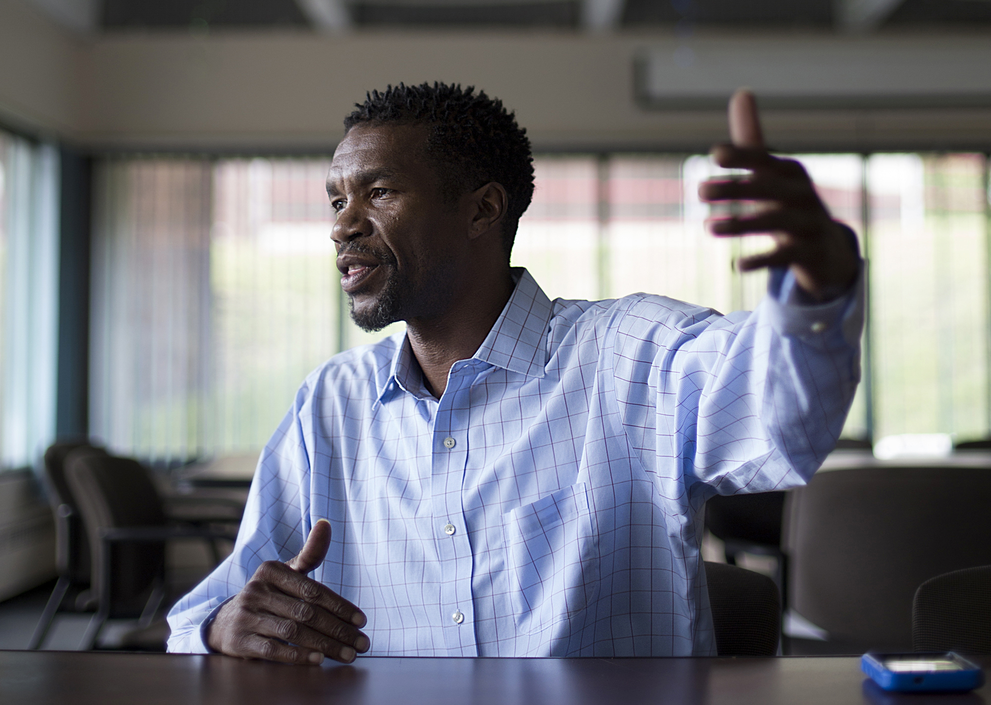 Neighbors: Men's advocate Manu Lewis lives on the frontlines of community pain.