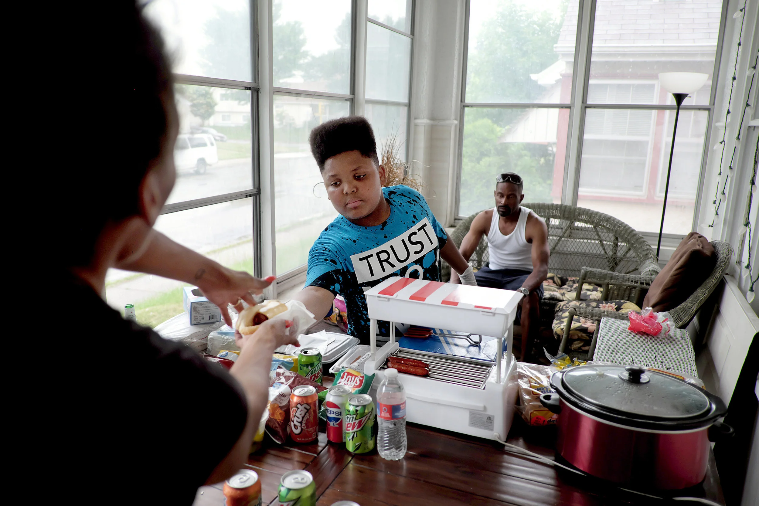 Rain or shine, Faulkner was committed to bringing hot dogs to his customers this summer, even if that meant moving his outdoor operation to his uncle's porch during a storm.
