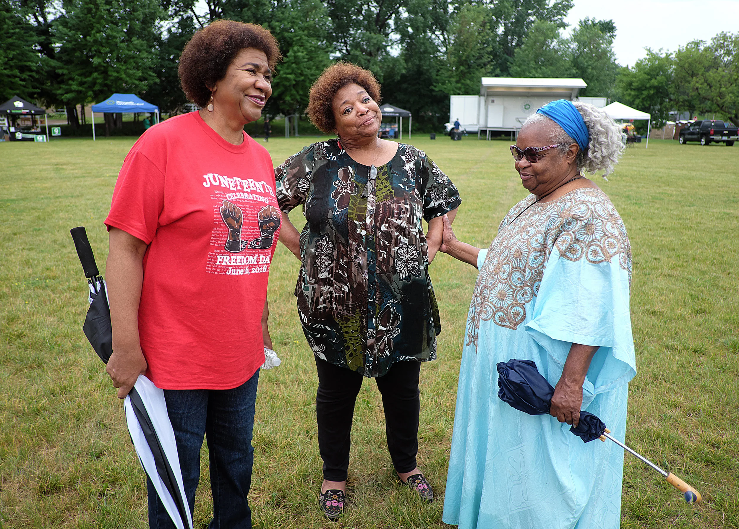 Freedom Day, a celebration of Juneteenth, was held in Bethune Park this year. Park Board Superintendent Mary Merrill (left) was instrumental in making it happen. Renowned storyteller Nothando Zulu (right) performed a piece called "Libations" on stage at the event.