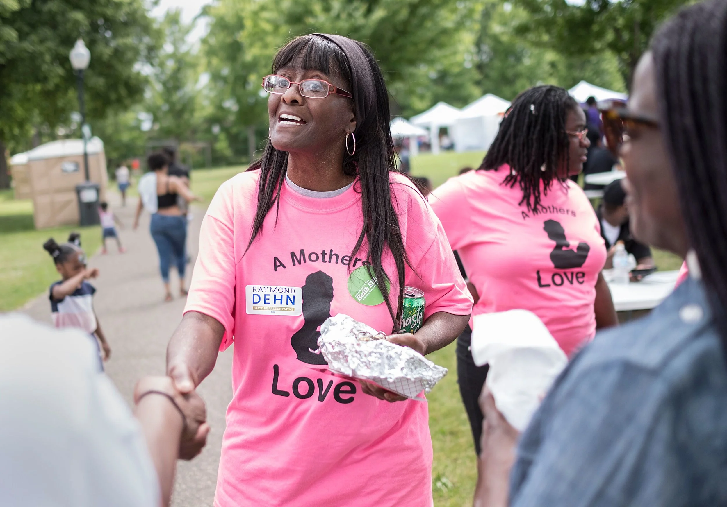 Founder of A Mother's Love, Lisa Clemons, connects with community members at the North Minneapolis Juneteenth Celebration on June 15.