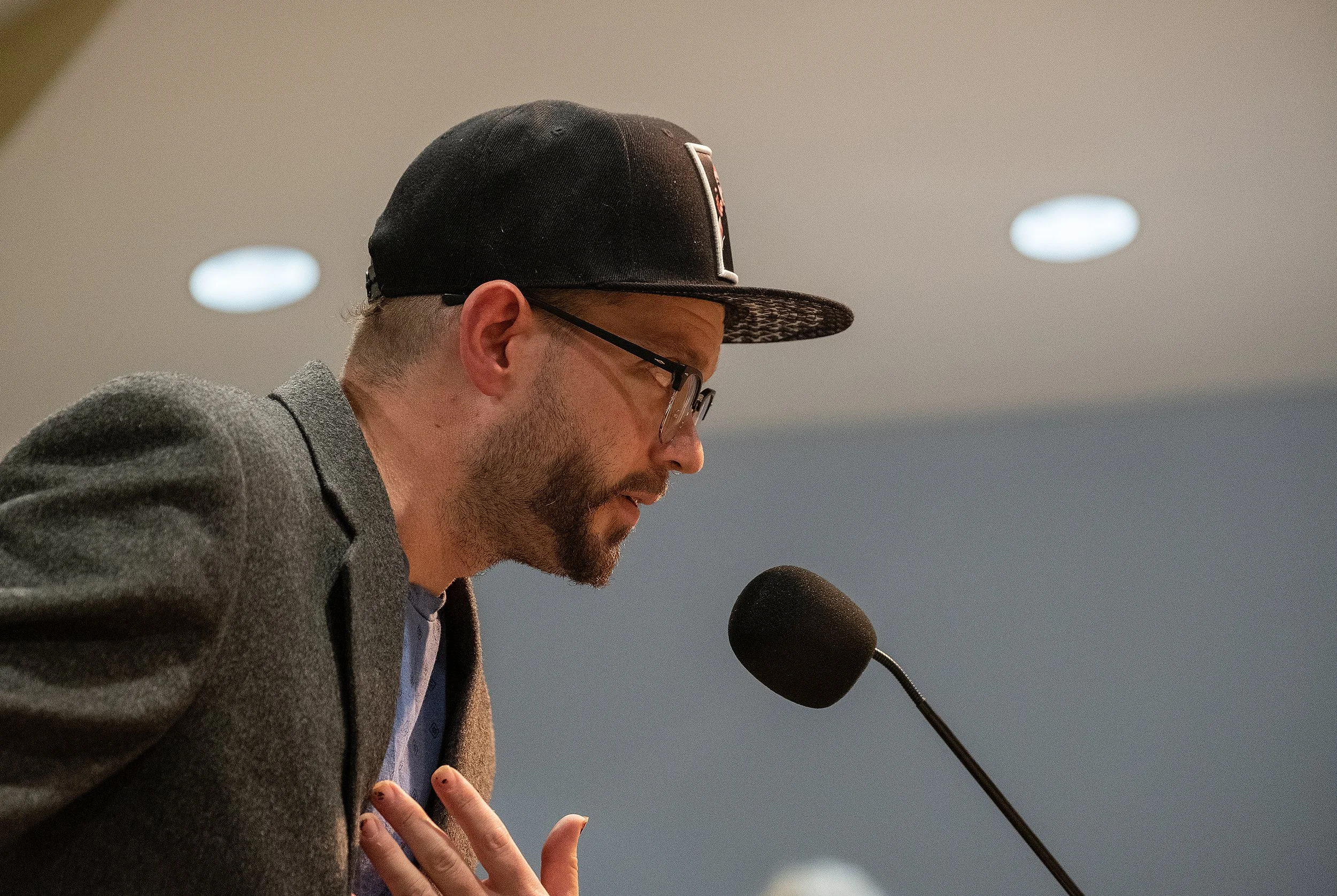 As tree bills hit the neighborhood, Mitchel Hansen had questions