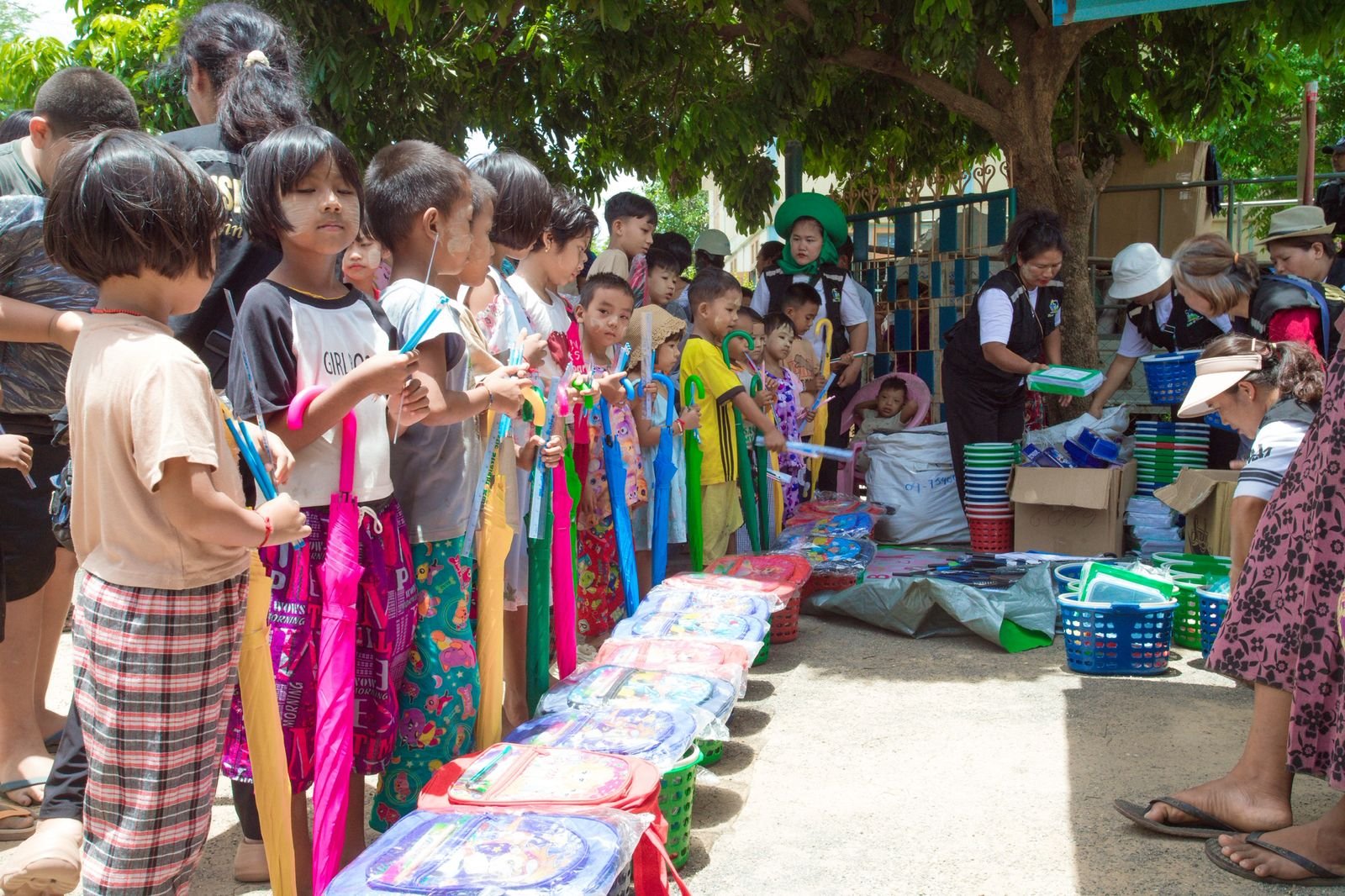 group of kids receiving gifts