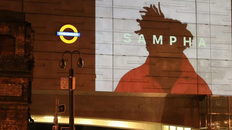 Sampha’s video projected in Shoreditch High Street Station in a guerilla film intervention in London.