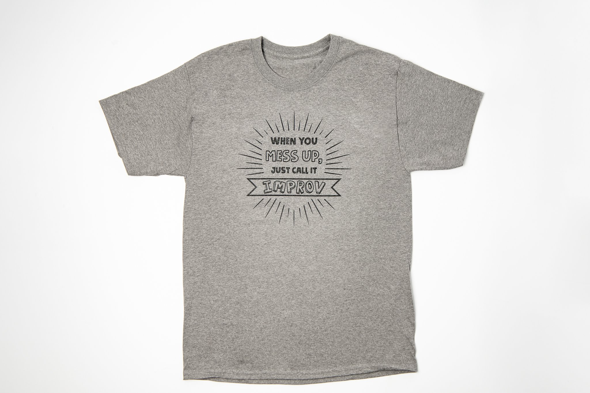 Our Motto on a t-shirt: "If you mess up, just call it Improv!" Purchase one in our online store!