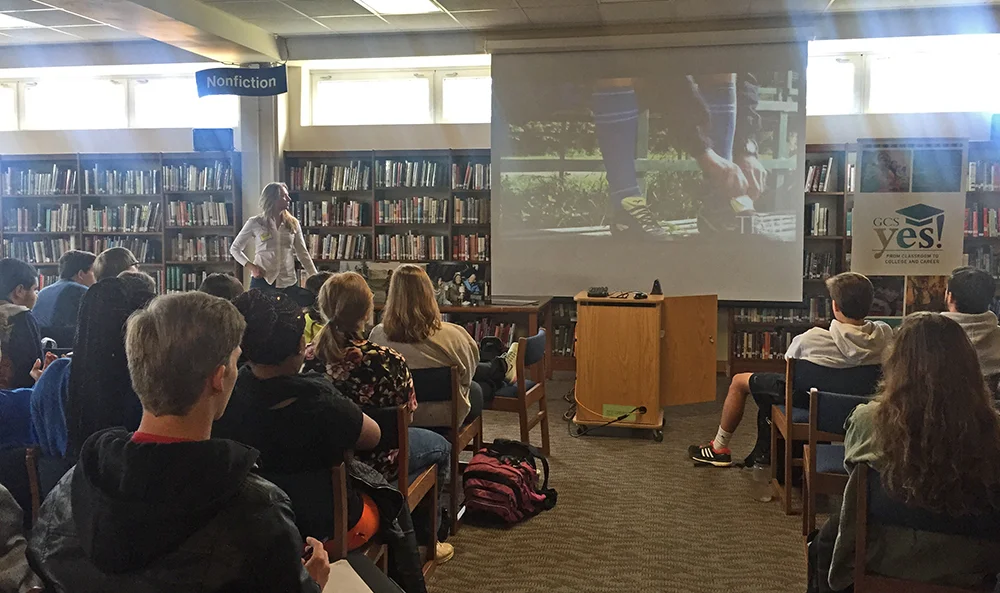 Rebecca talks with students at Grimsley High School in Greensboro, NC