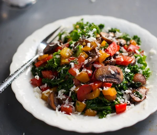 Salad with kale, peppers, mushrooms, cheese (Source: plated )