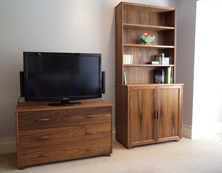 Walnut cabinet and chest of drawers